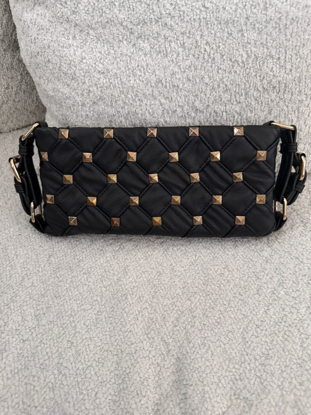 Black Quilted Studded Faux Leather Clutch by BeBe
